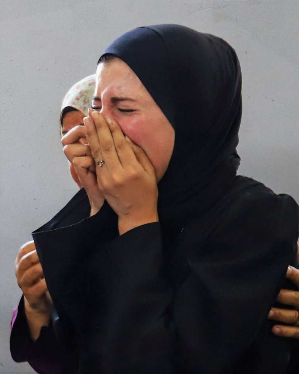 QudsNen's tweet photo. In pictures: The pain in Gaza never ends. For nearly two years, Palestinian families have been saying goodbye to their children amid a relentless Israeli genocide campaign, with mothers' hearts no longer bearing any more loss. https://t.co/FWTUKsGUeo
