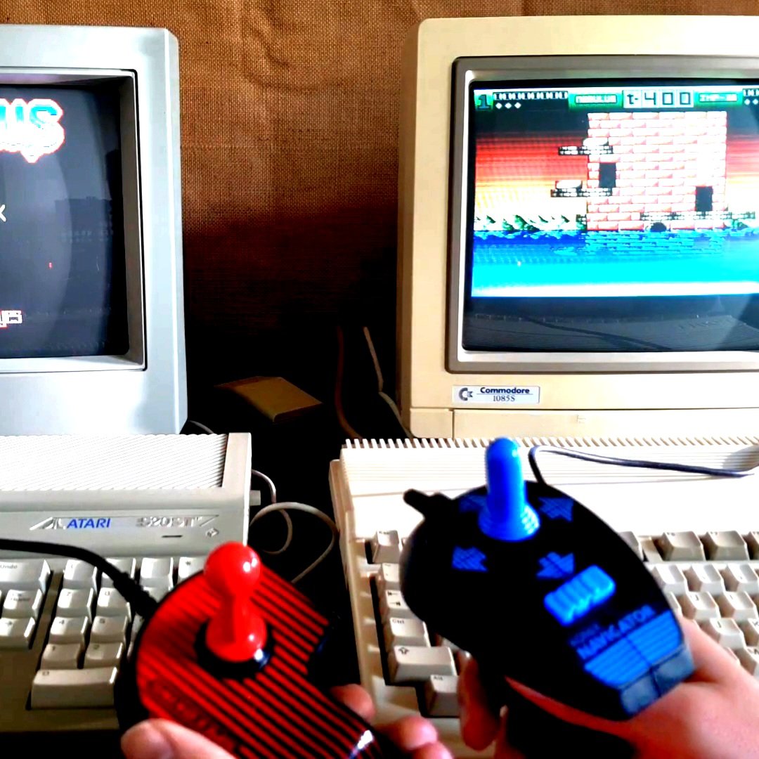 Left, Konix Speed King plugged to Atari ST playing Nebulus, Right, Konix Navigator plugged to Amiga 500 playing the same...