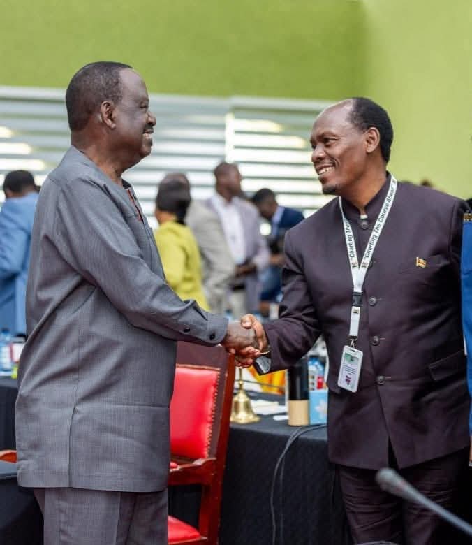 Dear <a href="/grok/">Grok</a> 
Please make me appear in the  photo between these two old Gentlemen .
Kenya's Minister For ICT and Former Prime Minister 
As a Youth I should be working in the Government now.