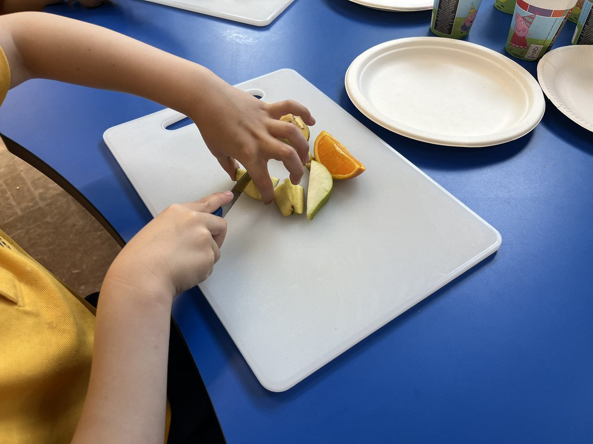 Our reception children eating healthy and sharpening their excellent cutting skills! #lifeskills