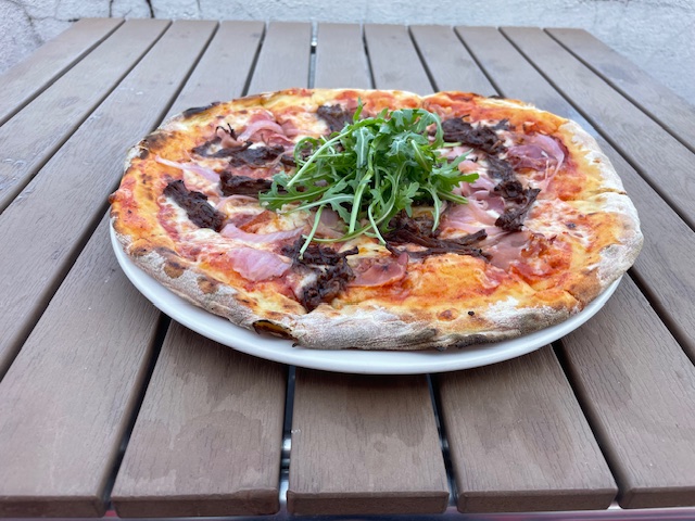 Behold the Meatfeast! 

A new addition to our menu from the 27th, as well as multiple meats this pizza is also topped with pickled sweet and sour red onion and a generous helping of hot honey sauce before being garnished with roquette once it's out of the oven.