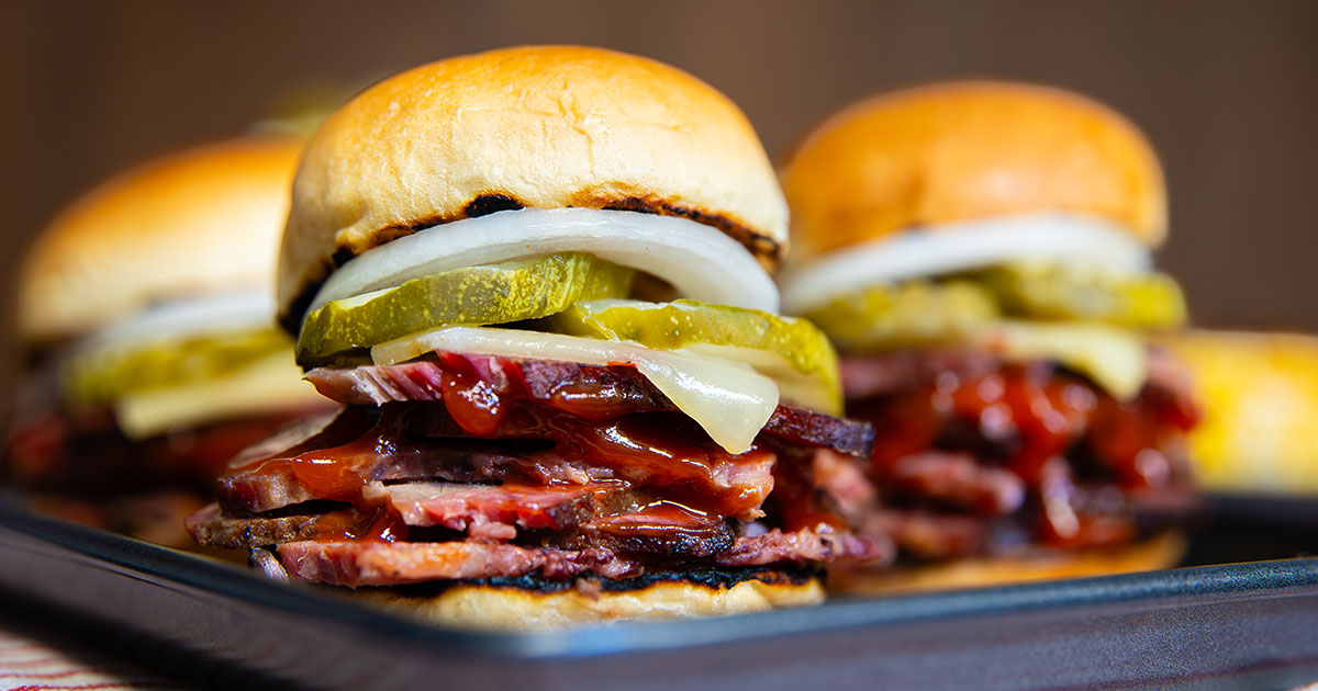 Smoked Brisket &amp; Pickles Sliders bring bold flavor in every bite. Tender smoked #beef brisket, tangy pickles, and BBQ sauce stacked on a soft slider bun—perfect for summer parties or backyard snacking.
Recipe at ohiobeef.org
#SliderSeason #SmokedBrisket