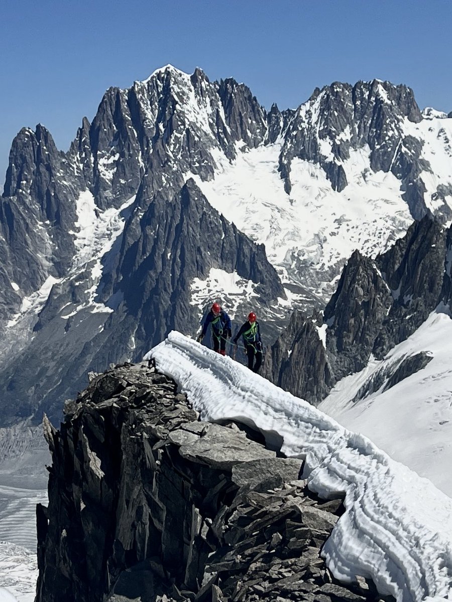 guidemark's tweet image. Training the next generation: arriving at the top of the Aiguille du Toule with the mighty Aiguille Verte in the background @The_JCMT