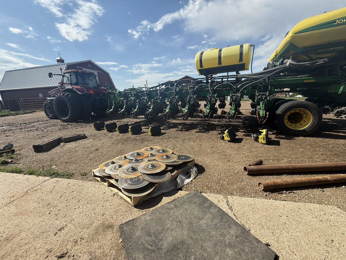 Rebuilding the planter out in the dirt where i belong.  Weird doing it this time of year… drop parts in the mud instead of snow and wearing a LOT less clothes