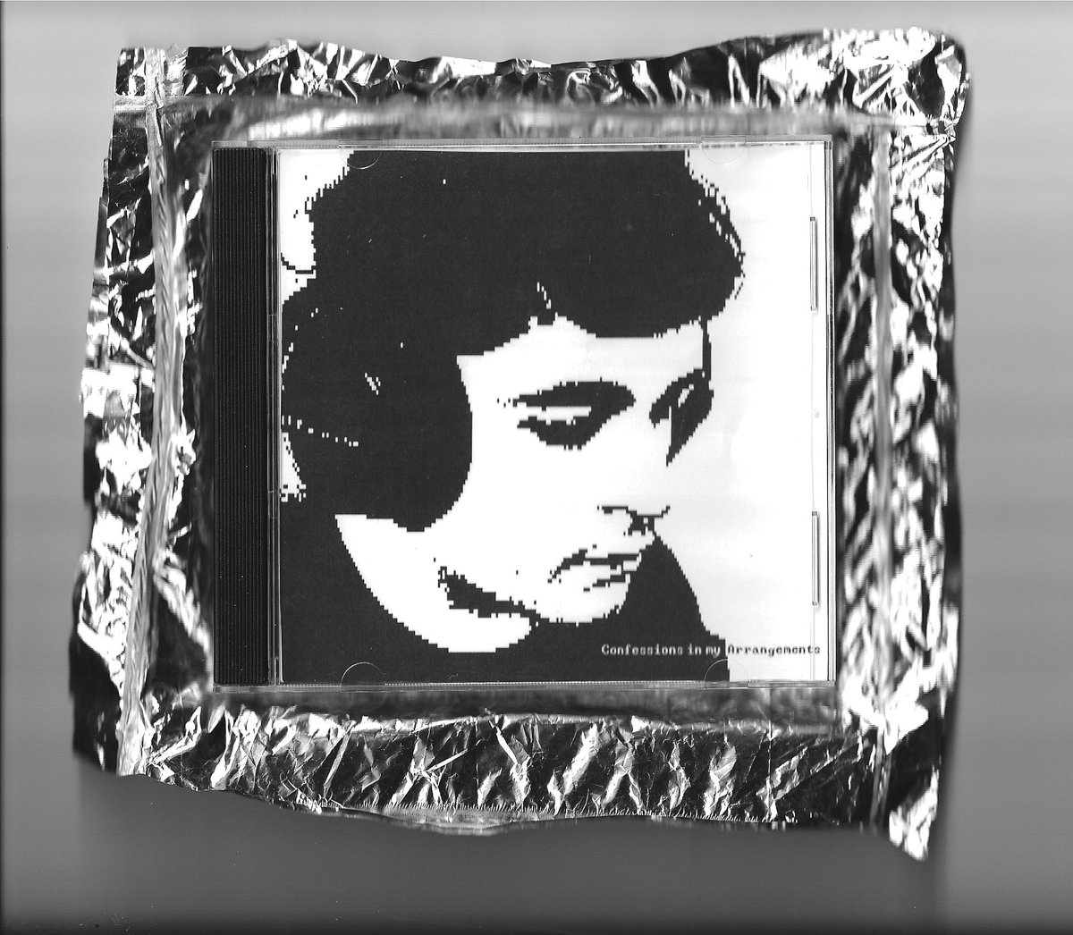 ‘Confessions in my Arrangements’ streaming everywhere now! 50 CDs up on the <a href="/BionicS_S/">BIONIC SOUND SYSTEM</a> bandcamp! 

All CDs are numbered 1-50 and come sealed in silver reflective mylar film, handcrafted by yours truly.

$10 / CD

Link in bleh