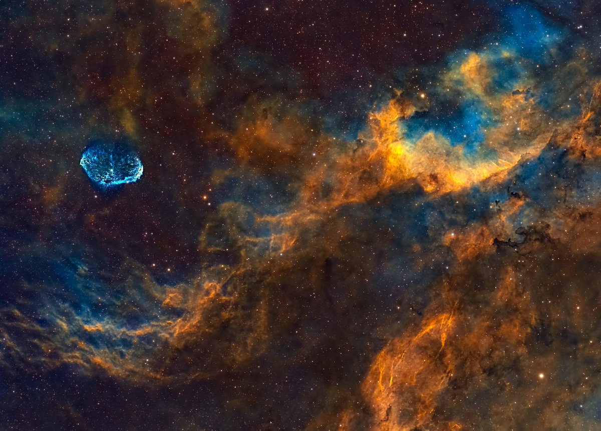 DerekFoster's tweet image. Cropped Sadr Region from Redcat, bit more detail with The Crescent Nebula on the left.
