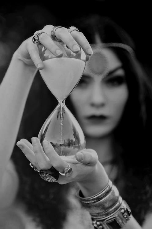 raven-eyed mistress of time 
counting grains of dreams 
every turn of the glass 
brings the moon into closer focus 

#micropoetry #microstory #mywords #inkmine 

#photo by Stacey Lynn