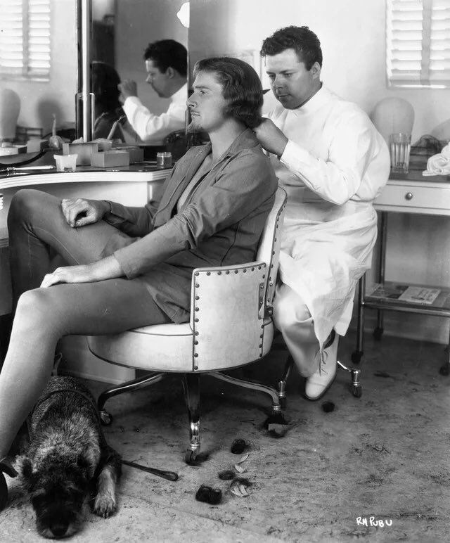 Errol Flynn photographed at Warner Bros. Burbank Studios in hair &amp; make up on the set of the 🇺🇸American Technicolor swashbuckler film “THE ADVENTURES OF ROBIN HOOD” (1938)