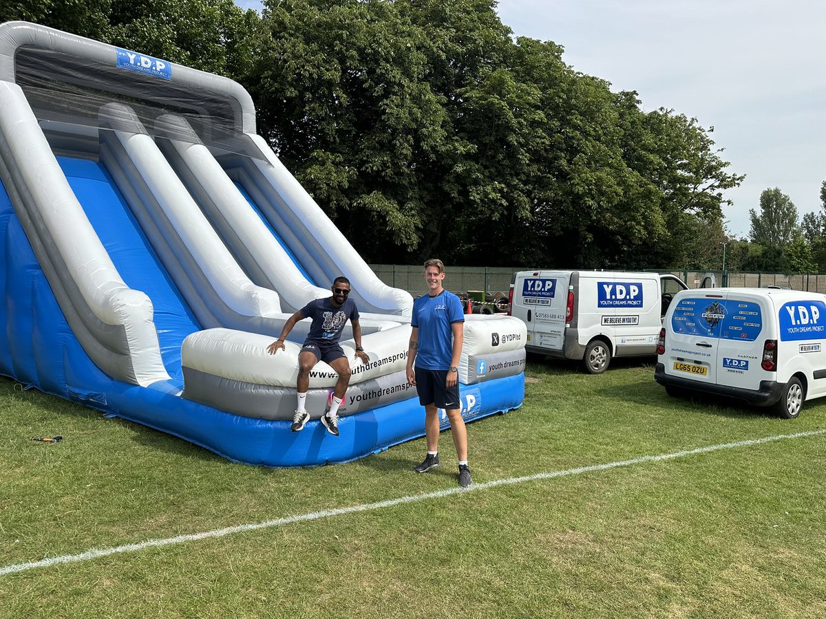 Part of the YDP Dream Team 🔵 making fun 🤩 of hard work! 

If only you knew how heavy this YDP slide is 😱🙈

Getting it out of the van and putting it back in the van is HARD WORK! But we make it fun work 😀🤣 

Once it’s up, it’s great for the children 🙏