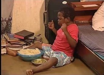 Me eating my money because it's too small for girls.