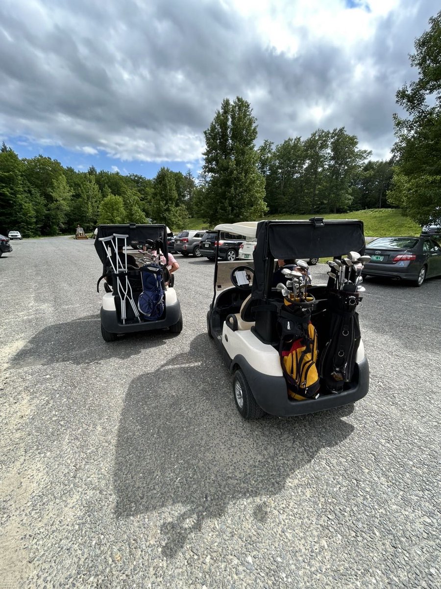 Nothing to see here, just two very normal golf carts with normal golf bags