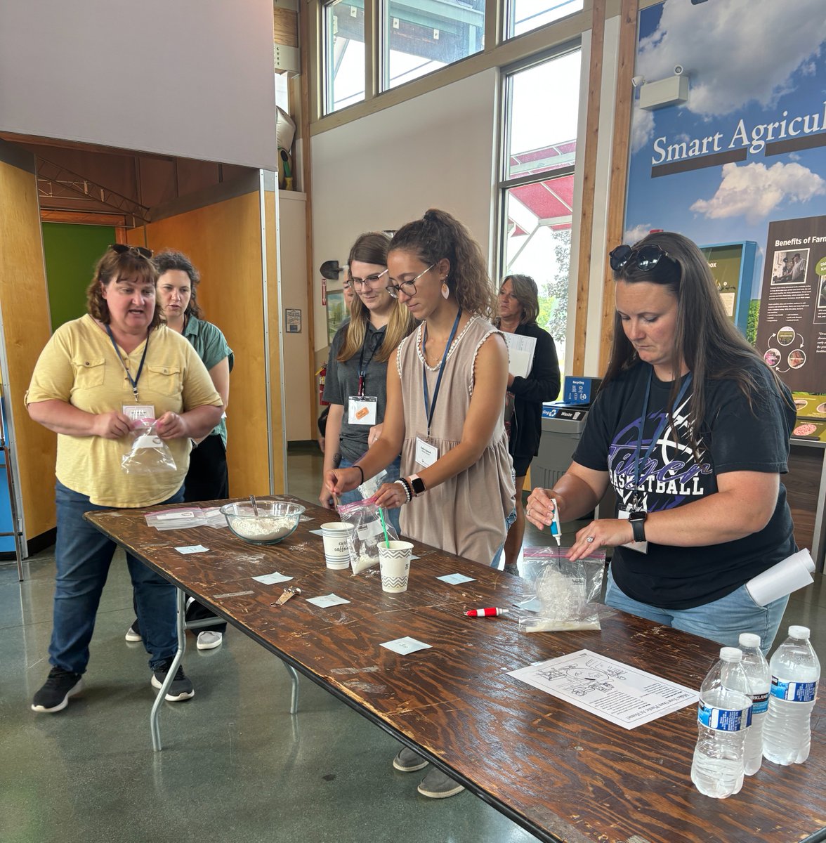 INSoybean's tweet image. Educators and volunteers explored lessons and resources highlighting the versatility of soybeans during the Indiana Ag in the Classroom Workshop. Participants created their own soy-based plastic, gaining hands-on experience in sustainable innovation. #ageducation #soycheckoff