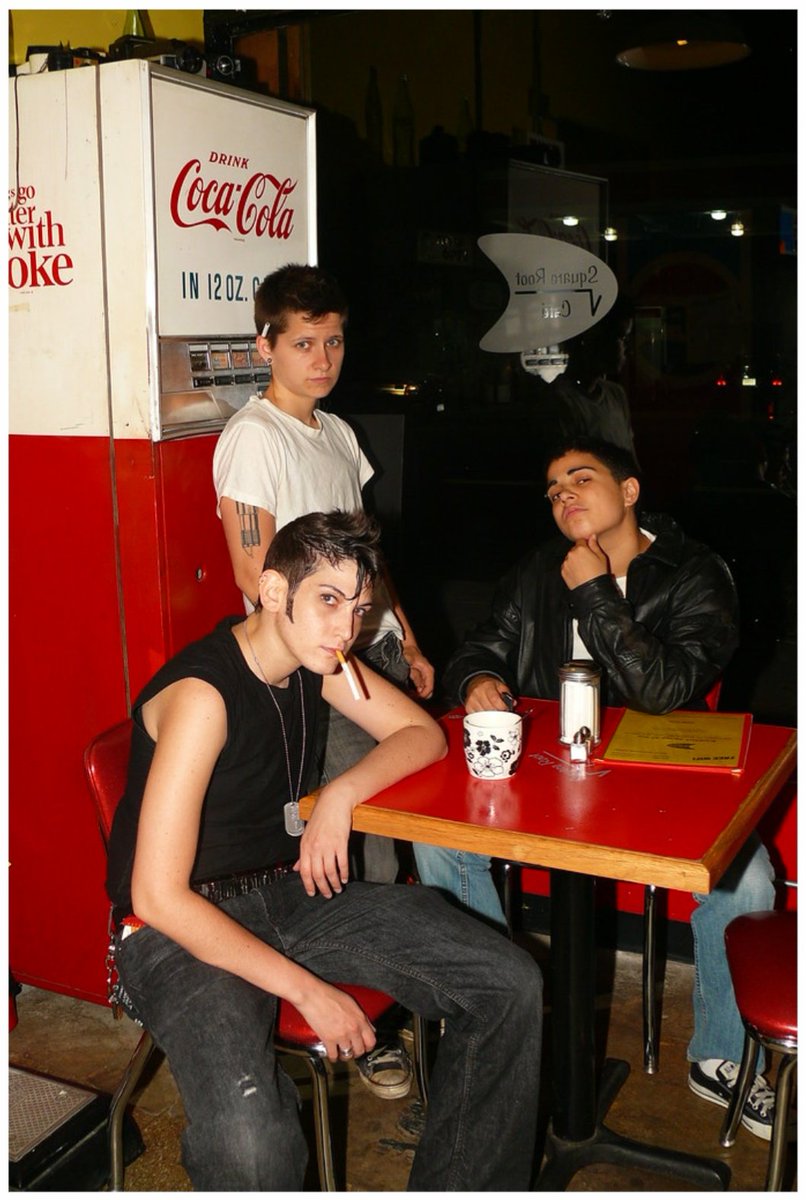 Butches and kings pose for a 1950s photoshoot.

'50's Bois' by Syd London, featuring kings Max Satisfaction, Pepe Pan and Syditious, 2008.