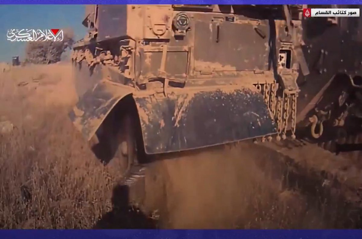 eldarwish90's tweet photo. I watched the video many times to try to believe it, a Palestinian resistance fighter with a very basic gun running after a $7 million Merkava that has four cowardly baby killers inside https://t.co/2nNLqcdJVI