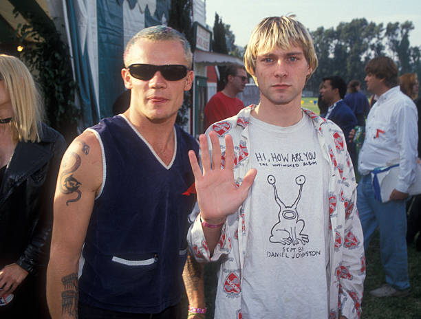 Flea of Red Hot Chili Peppers and Kurt Cobain of Nirvana (Photo by Ke.Mazur/WireImage)