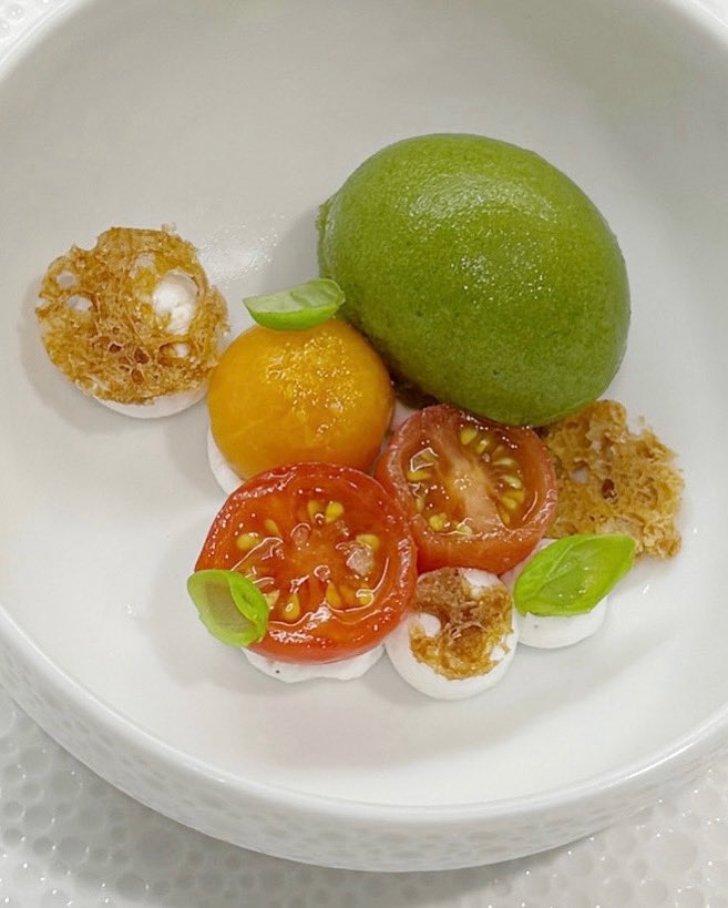 Tomato pre-dessert to welcome summer — grape tomatoes &amp; Thai basil sorbet from the vegetarian tasting menu