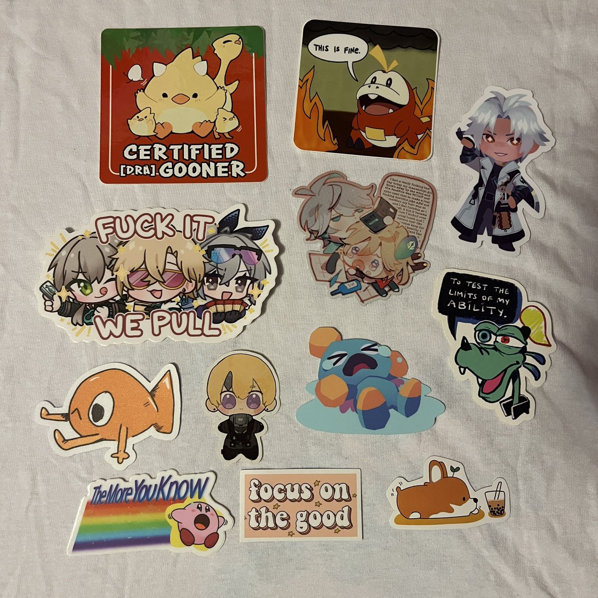 celestialnobody's tweet photo. fanime merch haul time <3
pt. 2 — stickers everywhere

♡ [dra]gooner (@redrabbu)
♡ fuecoco + kirby (@/bestauntieevershop - IG)
♡ f it we pull (@kitoodles)
♡ yappin (@rainubrew)
♡ steve (@jeunny__)
♡ thancred + chao + goofy (@_cdra)

second image is all @l0vetrisha <3 ! https://t.co/BjFq2FCiiG