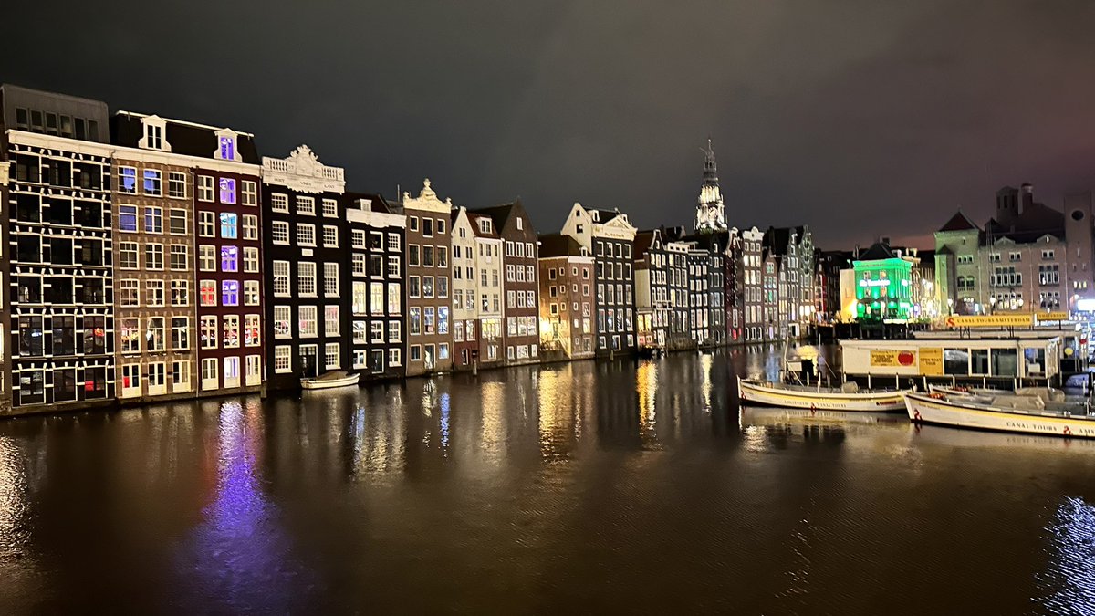 My picture is a little blurry. But this is Amsterdam, Netherlands

Such a beautiful city at night.