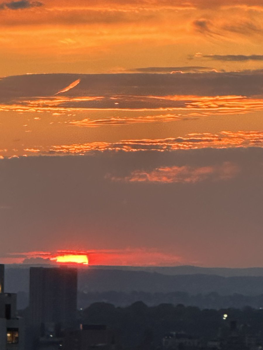 Cheers to an unfiltered sunset hours before summer solstice in the Capital of the World