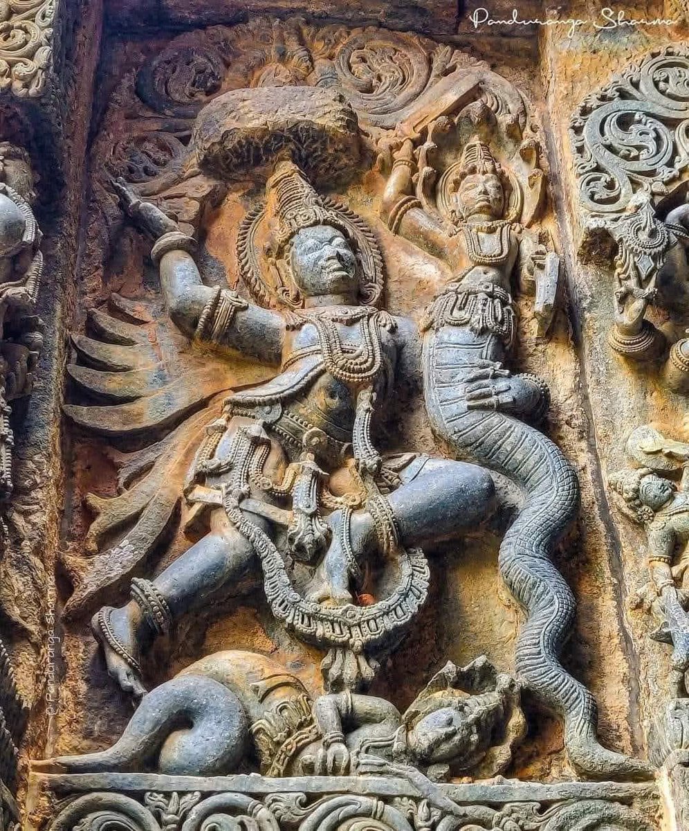 🚩 Garuda - Vasuki yuddha 
This wall relief carved on the outer wall of Hoysaleshwara temple in Halebidu, Karnataka depicts the war scene between Garuda &amp; Naga Vasuki .🚩
#IncredibleIndia