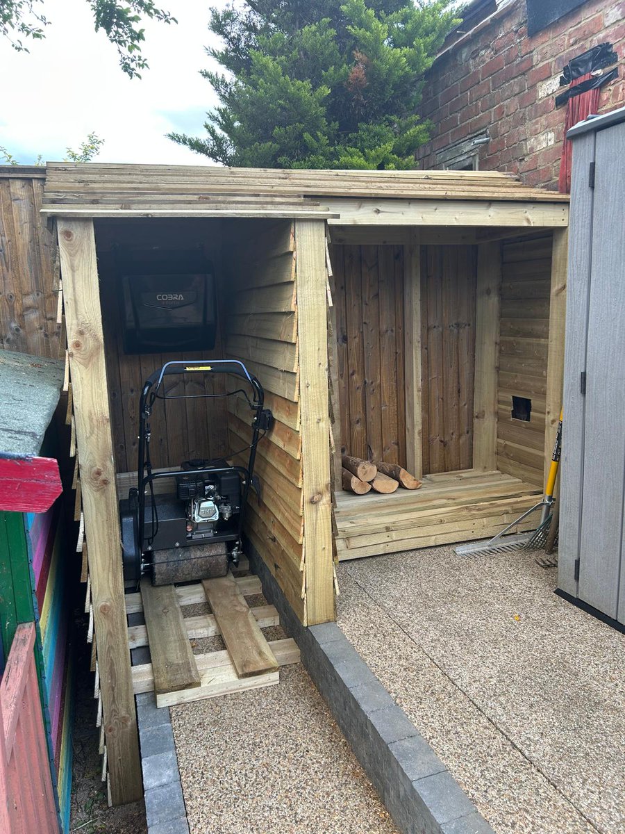 New log store with mower extension