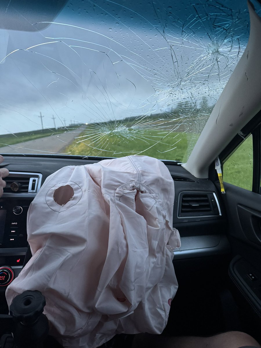 Ones of the most insane tornadoes and tensest moments of my life. Deer jumped out in front of our vehicle and obliterated my side of the car, disabling our vehicle as a VIOLENT wedge tornado developed just behind us near Spiritwood, ND. We are ok, Thank you to those who helped