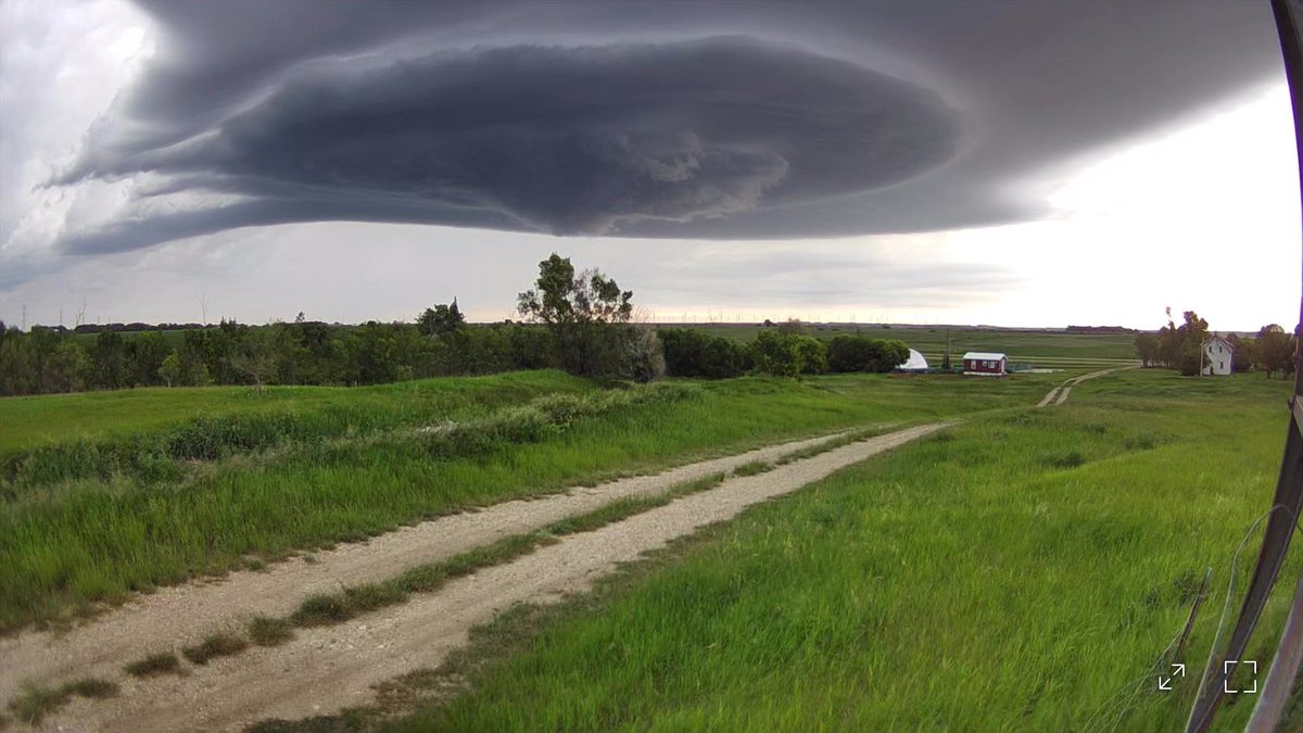 prairiejournal's tweet photo. @ReedTimmerUSA @NWSBismarck These photos were taken just before and after 9:00 p.m. About 15 miles north of Bismarck. With Ring cameras (remember, I am the stationary storm chaser 😁😁😁). I believe this storm was tornado warned. https://t.co/TAfoHCACBX