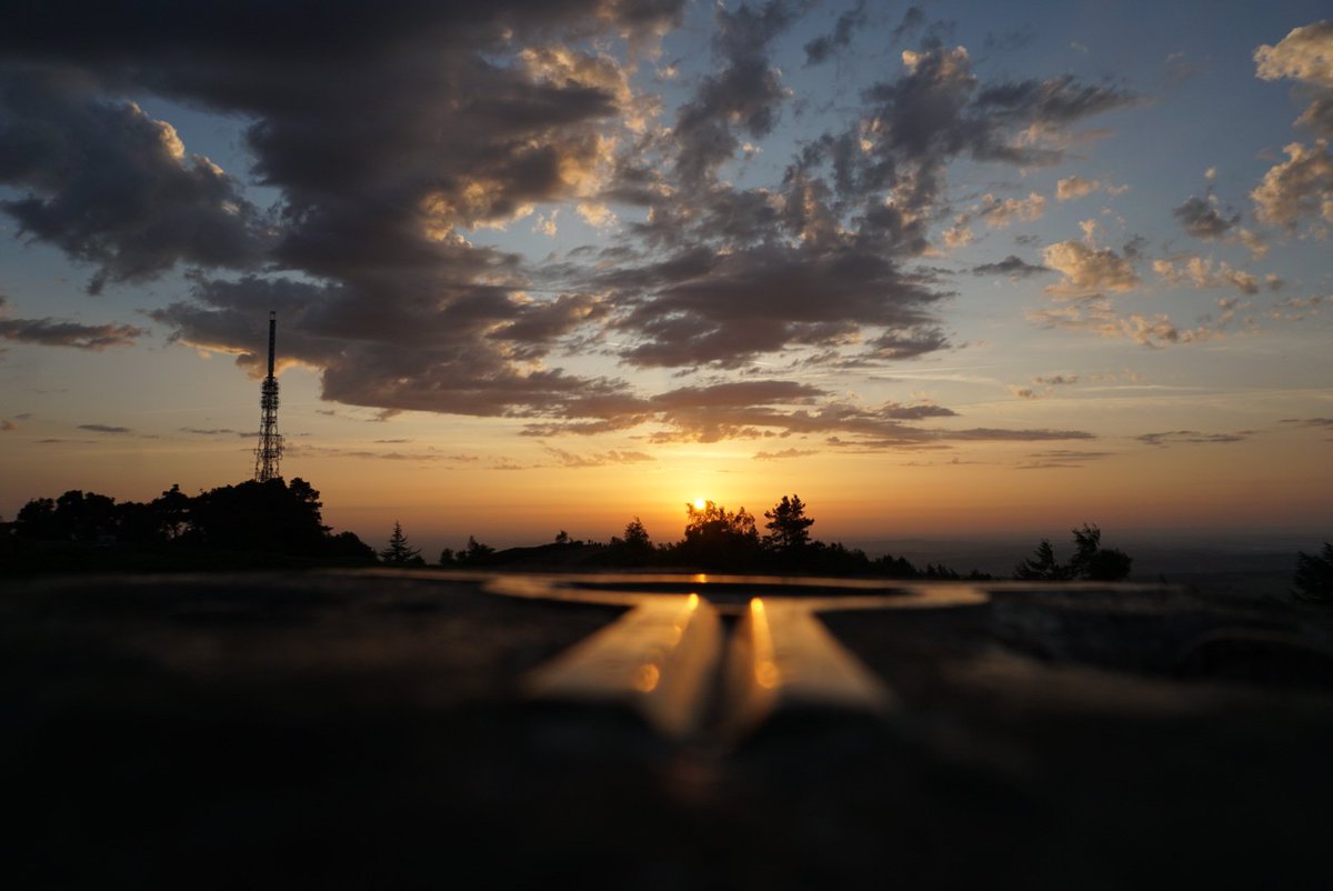 I was the Wrekin for the Solstice Sunrise - here the rising sun is seen looking over the summit's Trig Pillar's Spider