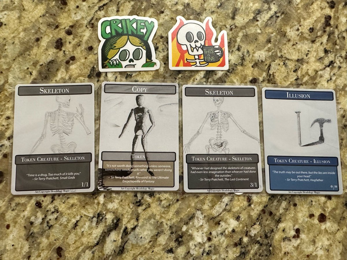 Thanks to Lady Rally, I have 4(!) new tokens made from baby Ariana’s artwork and featuring Sir Pterry quotes. And two new emote stickers (art by marsmehlo)! Find me at the con Saturday and Sunday (especially at the meet and greet 10:30-noon Sunday) if you’d like some!