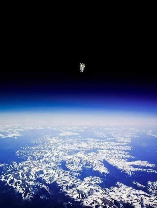 12. Astronaut Bruce McCandless II floats untethered away from the safety of the space shuttle, with nothing but his Manned Maneuvering Unit keeping him alive.