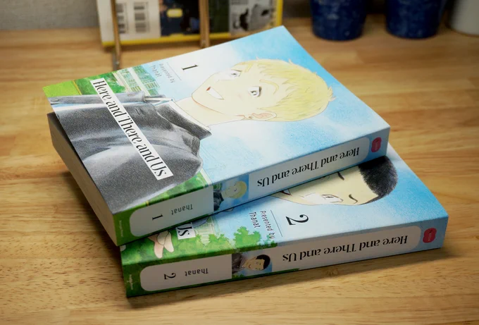 I just received sample copies of the English edition of Here and There and Us (New Edition) volumes 1 and 2. The print quality is gorgeous and I'm so happy! Thank you so much😻
See more details here: https://t.co/osUGHGjQFP 