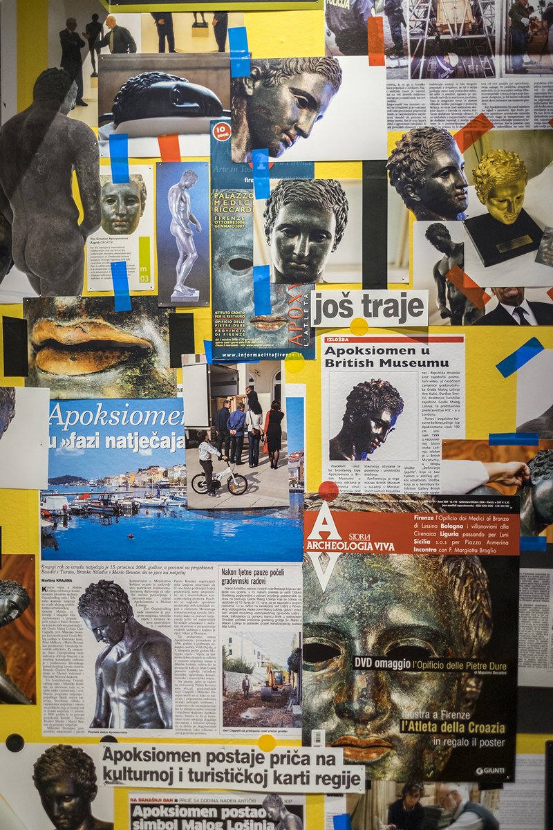 The Yellow Room at the heart of the Museum of Apoxyomenos showcases media stories, photos &amp; reports tracing the statue’s journey—from discovery to restoration, exhibitions, travels &amp; return to Lošinj—capturing public fascination with this unique bronze masterpiece.