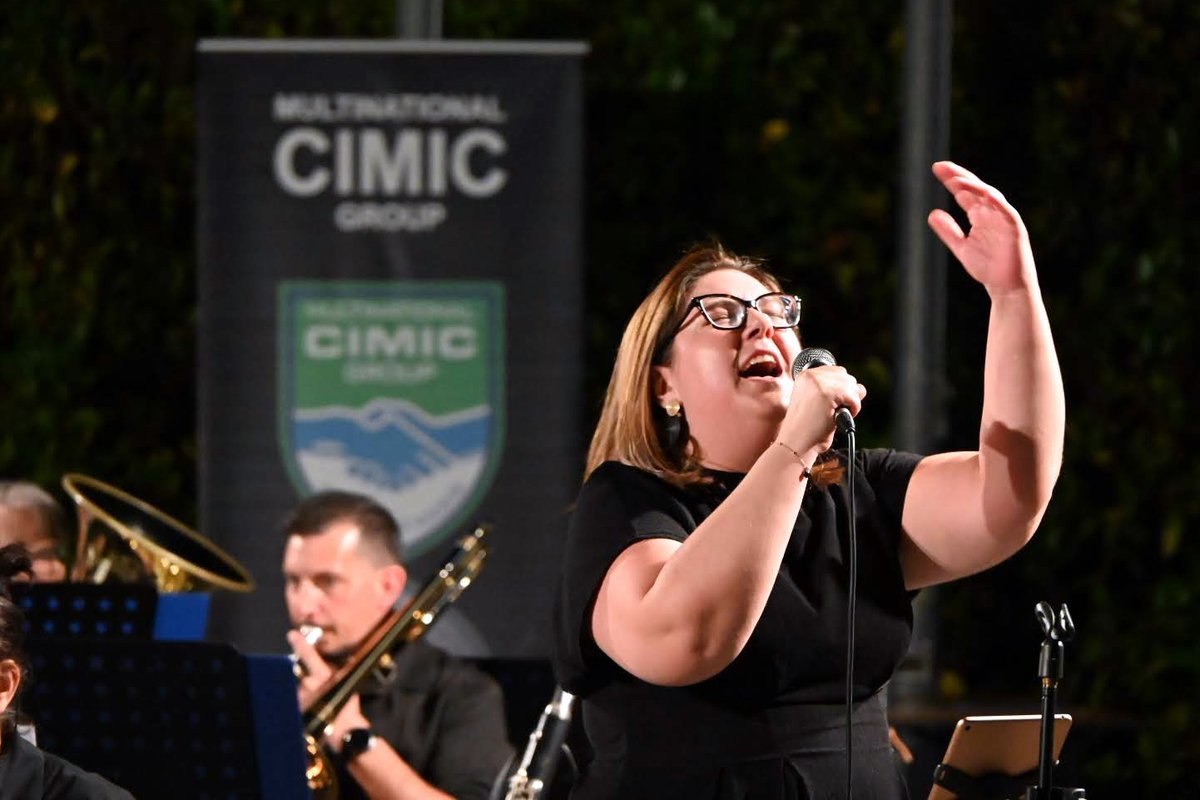 CimicMedia's tweet photo. 🎶 Emotions and great participation at the 2025 Summer Concert of the #MNCG!
An exciting journey through iconic movie soundtracks, a valuable opportunity to strengthen ties with local authorities and the community.
Thank you all! 🎥👏
#CIMIC #NATO #MilitaryCulture #SummerConcert https://t.co/PxE1Dqtjku