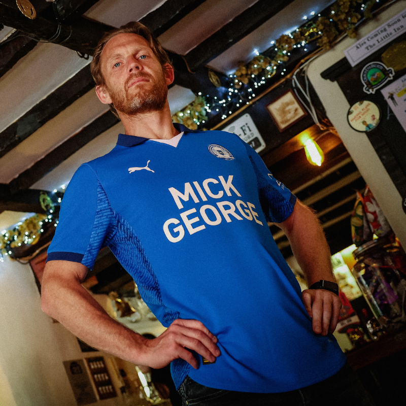 theposh's tweet photo. Write your name in history alongside @A9Mac, @12CMS12 and our Posh legends 💙. 

To find out more about our 2025/26 Home Replica Kit, visit ⬇️  

#pufc