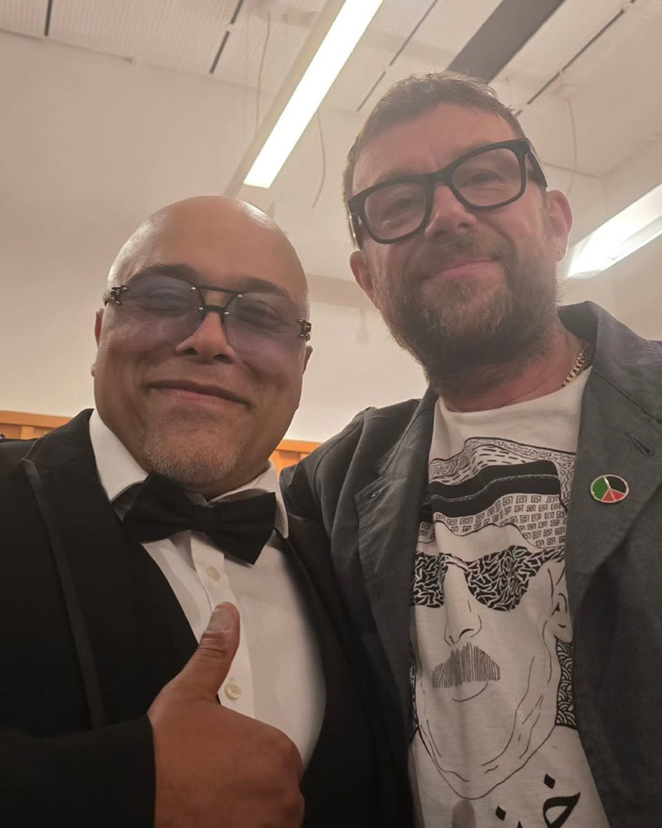 Damon and Maestro Tarik Saeed, Saturday night with the London Arab Orchestra at the Barbican 

Pictured on Damon’s tee: Omar Souleyman