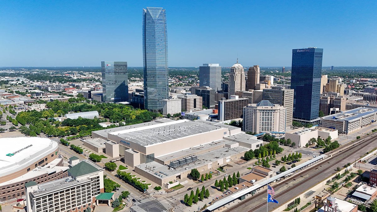 OKCTalk's tweet image. Crews have started to demolish the north wall of the former Myriad/Cox Center and dismantle a 145-foot-long glass and steel pedestrian skybridge.
The new Thunder arena will be built on this site starting early next year. First renderings should be revealed next month.
