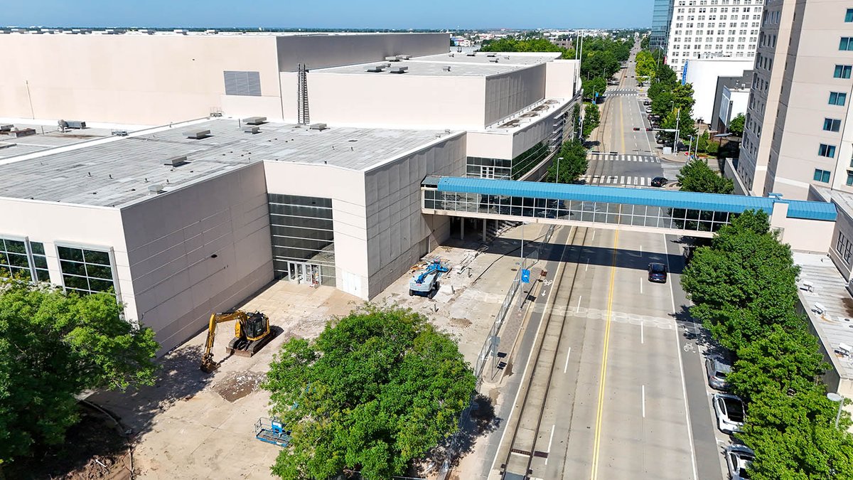 OKCTalk's tweet image. Crews have started to demolish the north wall of the former Myriad/Cox Center and dismantle a 145-foot-long glass and steel pedestrian skybridge.
The new Thunder arena will be built on this site starting early next year. First renderings should be revealed next month.
