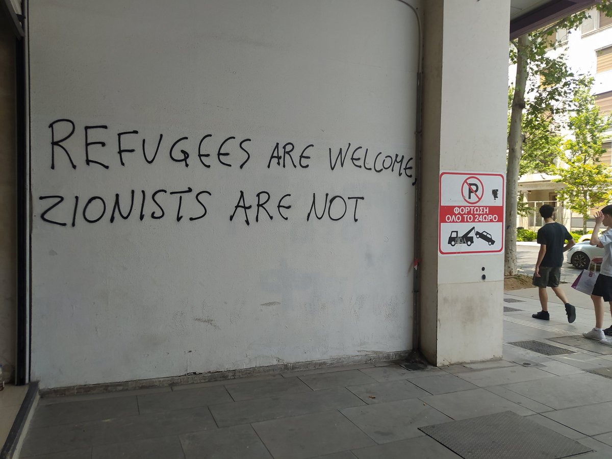 Athens Greece , commercial centre and all over the streets, we see grafiti like this. Zionists tourists that vacation in Greece while their country commits genocide are clearly not welcome say the locals.