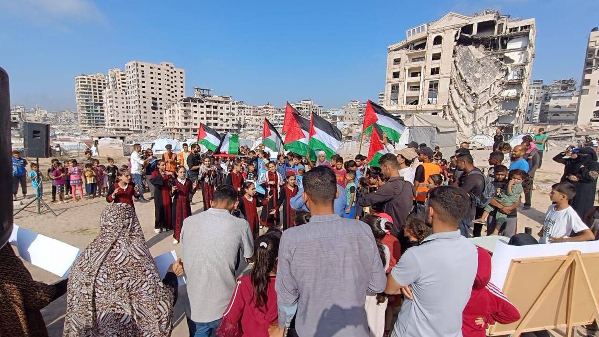 Children in Gaza organise a stand in solidarity with the activists who were kidnapped by Israeli forces from the Madleen humanitarian ship earlier today.