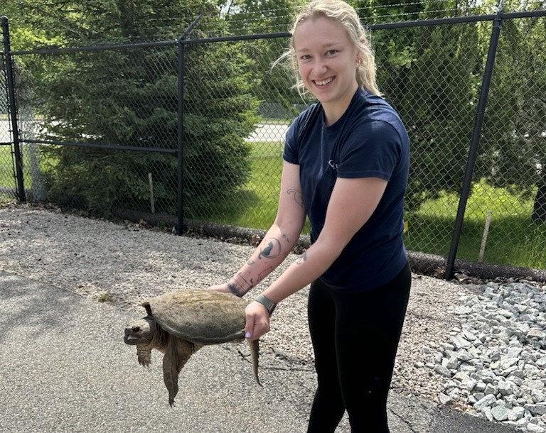 Wildlife conservation isn't part of the official job description, but our team members go above and beyond! When this little guy found his way inside the fence at our pump station, Hannah didn't hesitate to bring him back to safety.