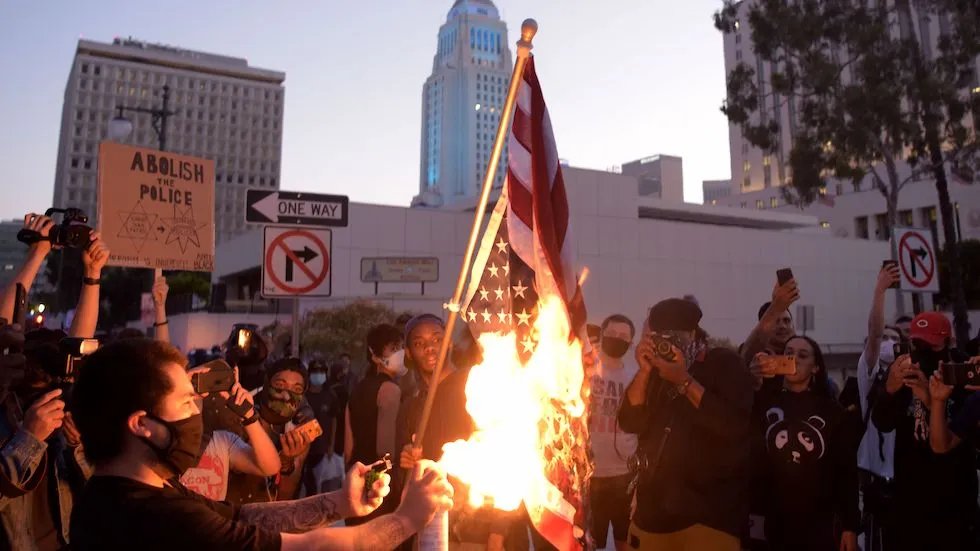 The United States Supreme Court ruled in the landmark case  - 'Texas v. Johnson (1989) that flag burning is a form of symbolic speech protected by the First Amendment.'   

It wouldn't be dificult to charge someone with burning the american flag and then having the case brought