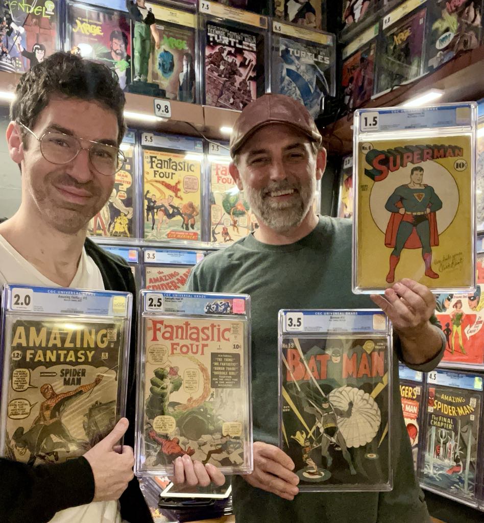 Two comic nerds enjoying the collection :)