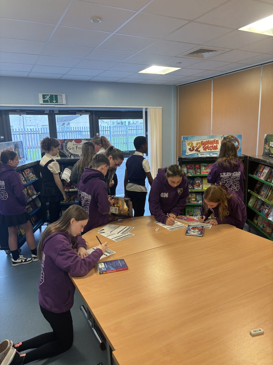 MissCarbery1's tweet photo. Pupils exploring the Book Fair. Parents/carers can purchase books online or visit the school on Wednesday at 2pm. It is card only! Thank you to Cali and Chelsea for helping today 📚📖 @HareleeshillPS @HareReads #itsSLC https://t.co/nj9dr7SrBj