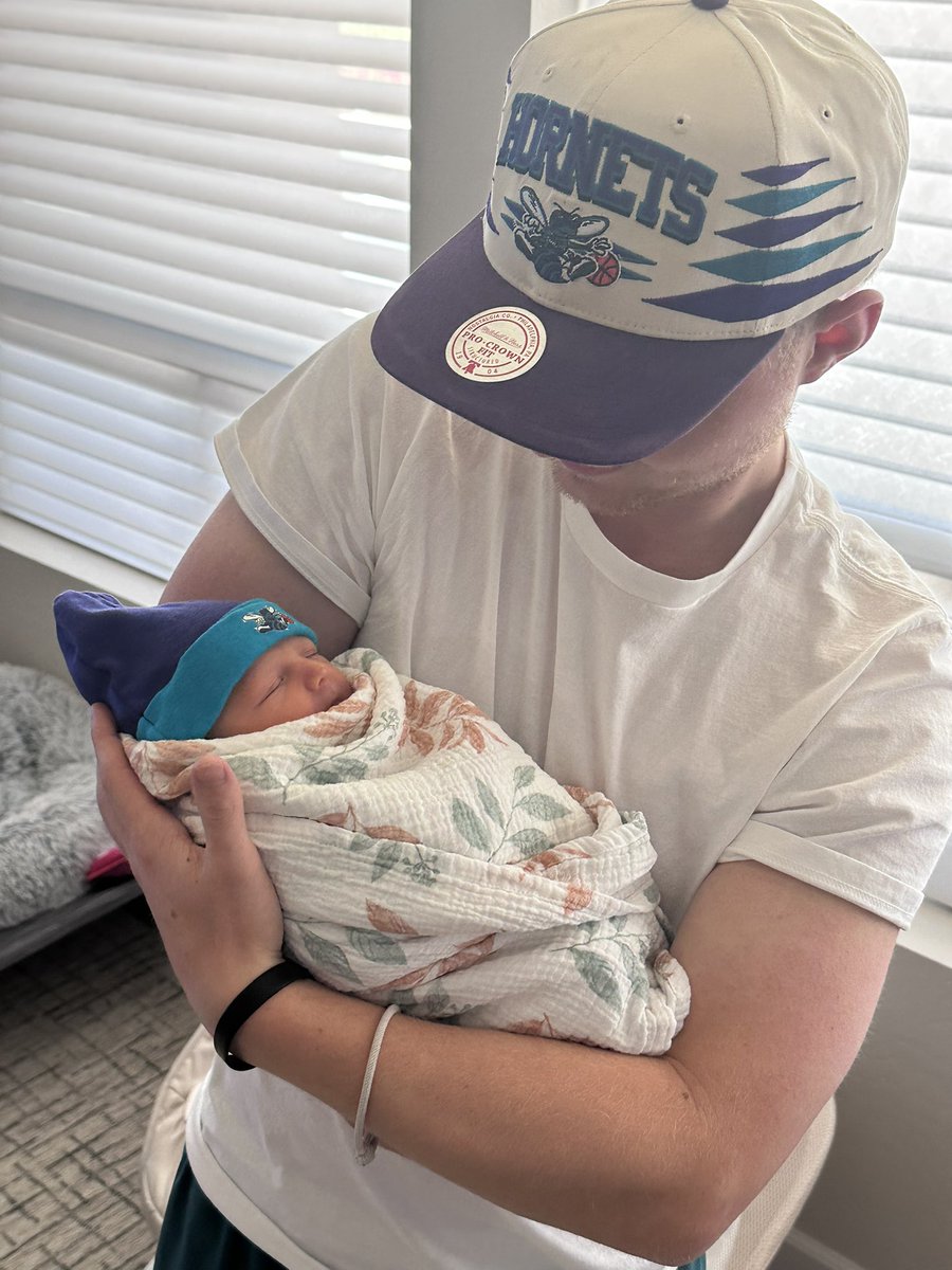 carsonknowsball's tweet photo. I’m officially an uncle. Which means it’s time to welcome a new member to the Charlotte Hornets fandom! https://t.co/FvI9O0gdMP