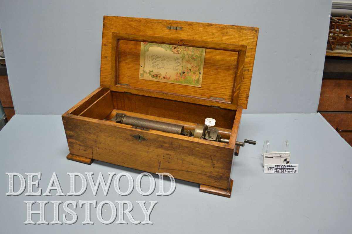 Swiss Music Box
Photo: Deadwood History Inc., Adams Museum Collection. #DeadwoodSD #history #deadwoodhistoryinc #Visit #artifacts #vintage #musicbox #beautiful #historic