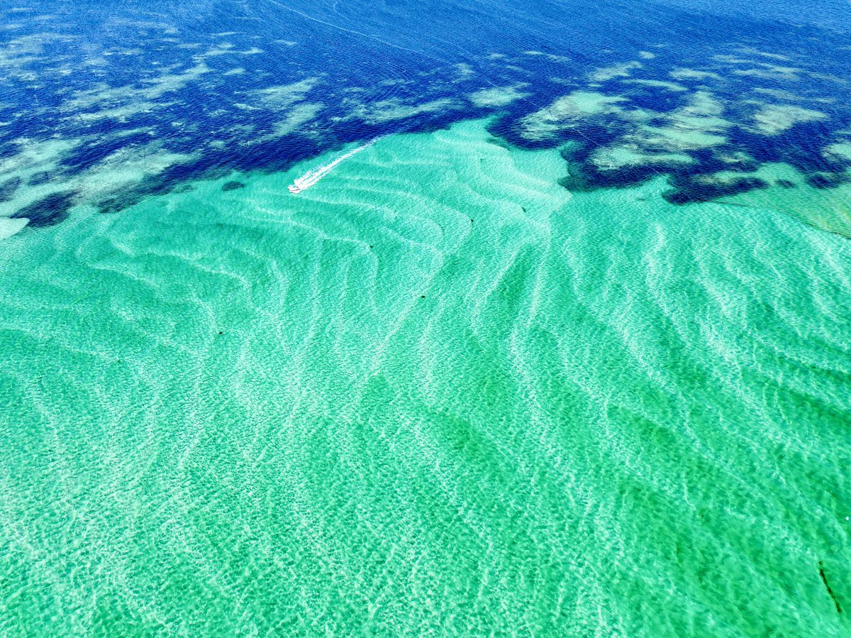 Sand designs on the bottom pictorem.com/2351112/crab-i… Crab Island by Destin30A Drone Wall Art