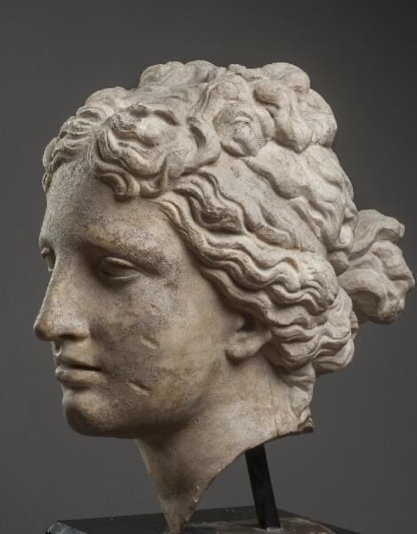 Marble head of the goddess Aphrodite, dating to the Hellenistic period (323-31 BC). Private Collection.