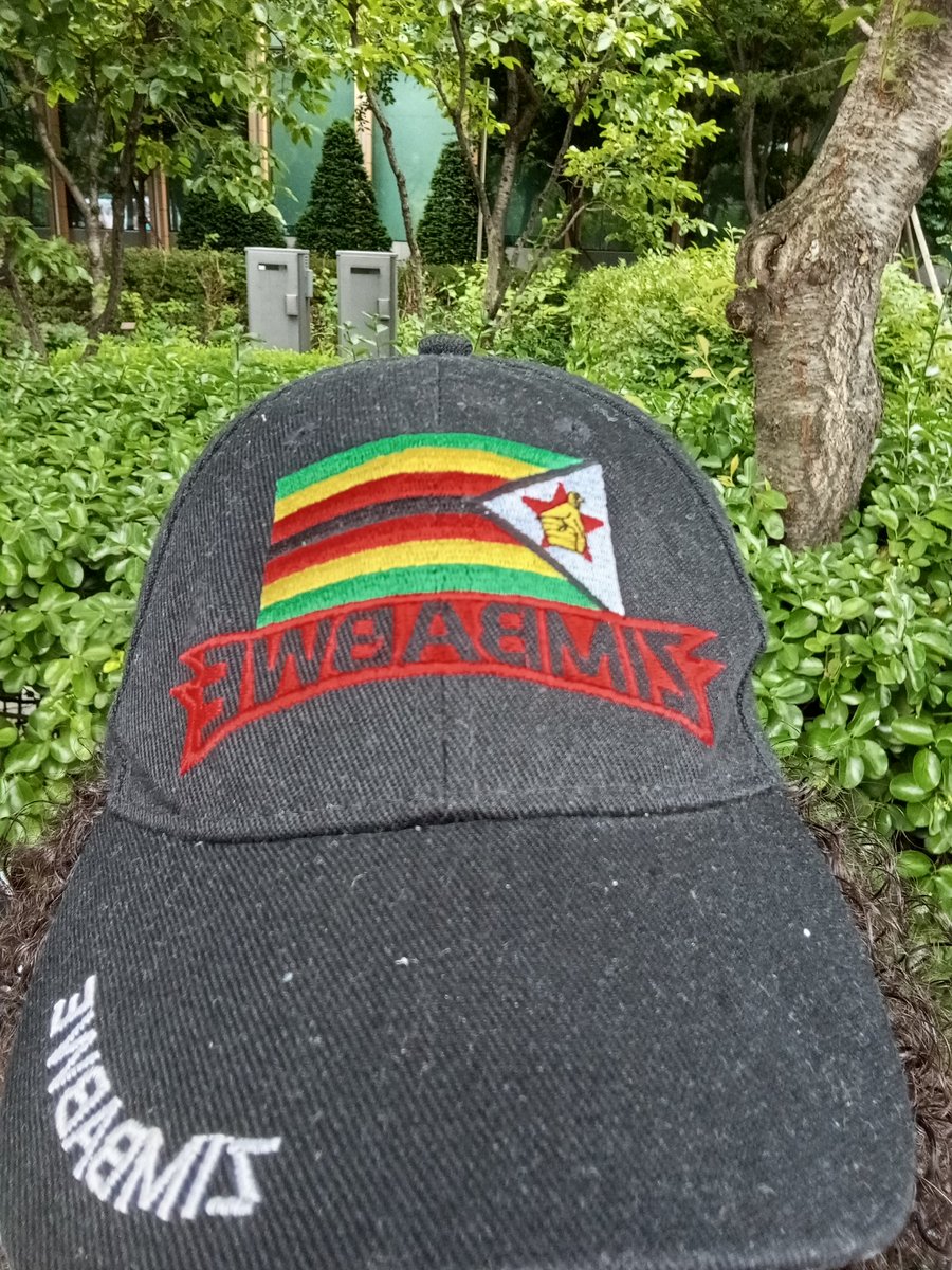 BTS_Zimbabwe's tweet photo. Lots of trucks and buses around. Sticking to my spot for now. Lots of police presence for crowd control as more of us arrive. Admin in the cap if you want to say hi. #BTSFESTA2025 #btsisback
#RMisBack
#VisBack https://t.co/4aKaSUITkZ
