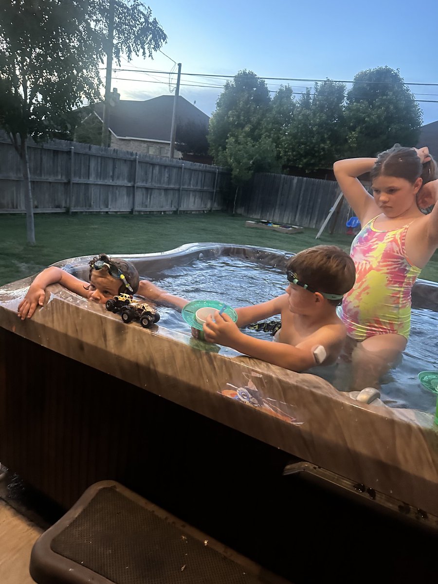 Could life get much better! Eating snow cones in the hot tub while watching Super Kitties on the tv.