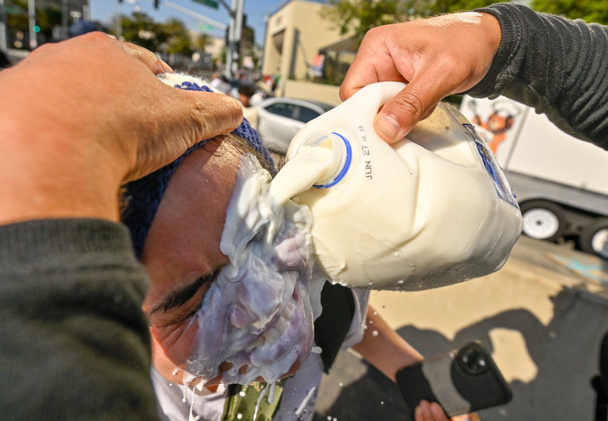 Unrest continues in Santa Ana as about 400 anti-ICE protesters stand off against police at the Federal Building. <a href="/ocregister/">O.C. Register</a> #ILLEGALimmigrants @immigrants